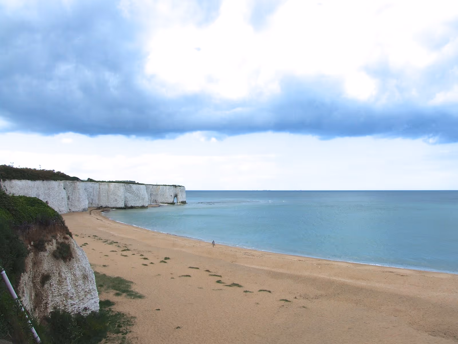 The chalk arch and sheltered sandy cove at Kingsgate Bay