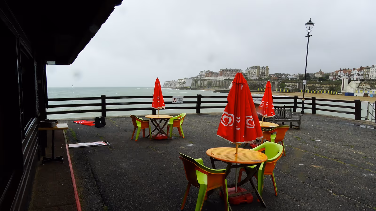 Cafe tables on the slipway at Viking Bay, Broadstairs, above the sand